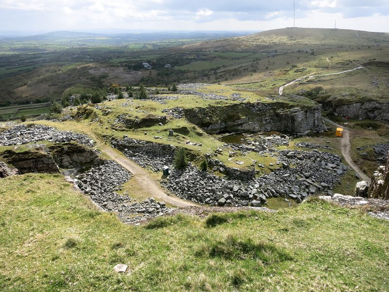 The worked faces of Cheesewring Quarry, a disused granite quarry cut into the side of Stowe's Hill on Bodmin Moor.