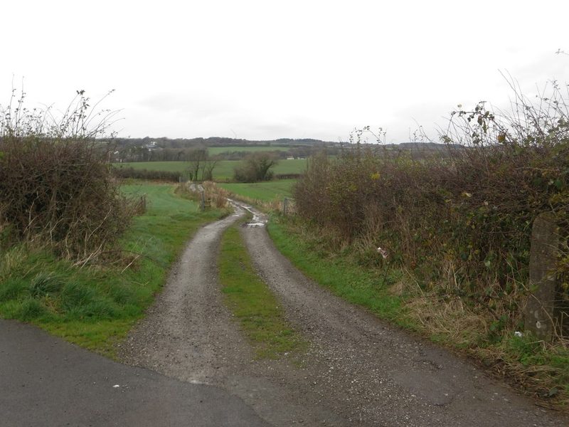 A farm track between arable fields north of Great Clifton village, the ground where the William and Lowther pits stood