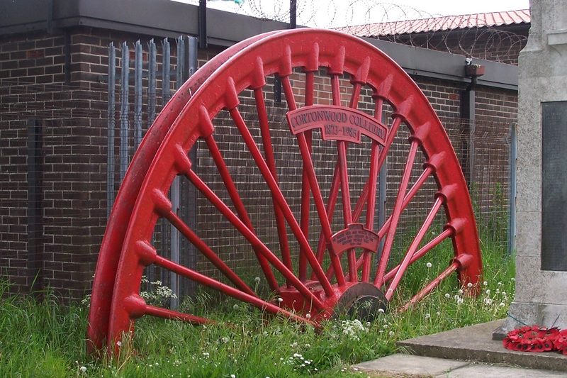A stone memorial to Cortonwood Colliery on Knollbeck Lane, Brampton Bierlow, recording the dates 1873 to 1985.