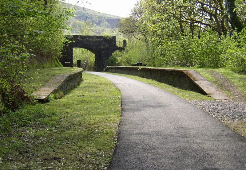 A small disused railway station platform and building at Cynonville, the garden village built in 1910 to house Cynon Colliery workers, now a cycle track.