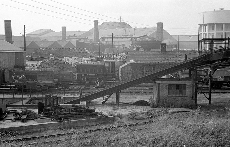 A Ruston & Hornsby diesel-electric shunting locomotive standing among loaded wagons in the colliery sidings at Ellistown.
