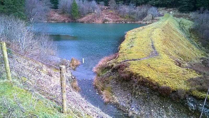 The reservoir at the top of Hendre-ddu slate quarry near Aberangell, ringed by forestry.
