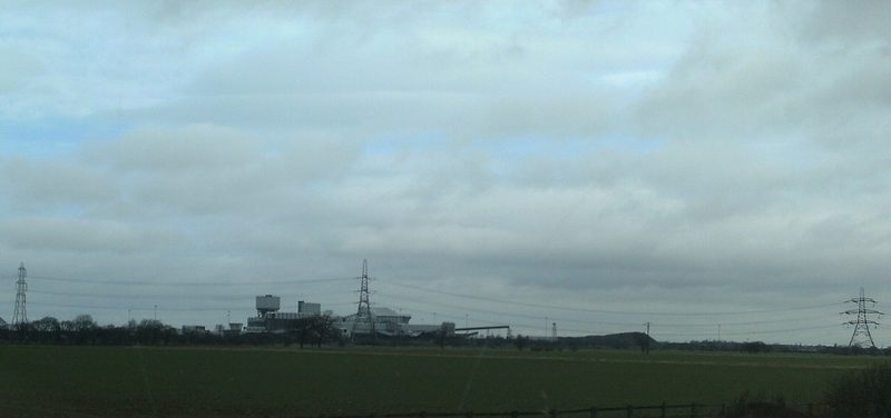 The south side of the colliery, its winding towers and cooling plant strung out along the horizon, seen from the M62