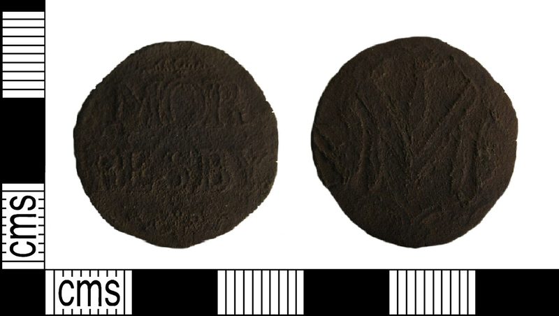 A worn circular copper-alloy token, both faces shown, made for use at Moresby Colliery in Cumberland and recorded by the Portable Antiquities Scheme.