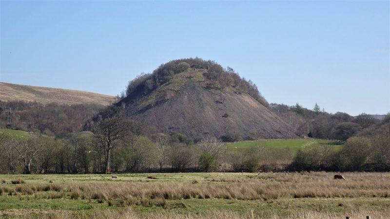 The spoil bing of Pennyvenie Colliery on the hillside above Dalmellington, East Ayrshire, photographed in April 2023.