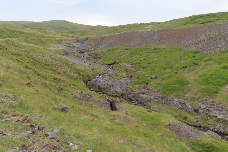 Spoil and surface workings of an old lead mine on the open moorland flank of Plynlimon, photographed in 2025.