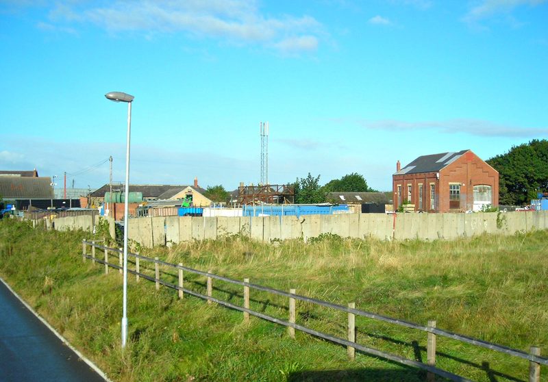 The former pit yard at Seghill Colliery, where some of the original colliery buildings survive alongside later industrial units.