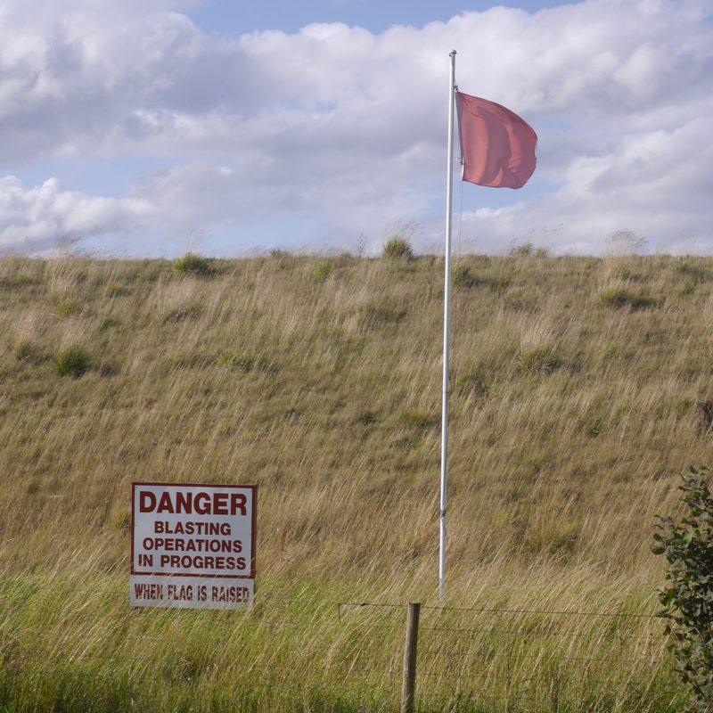 The worked-out benches and haul roads of the opencast coal site cut into the Northumberland farmland