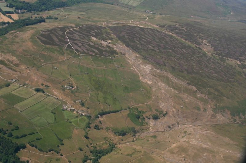 An aerial view of the Tanner Rake hush and mine workings scarring the moor above Slei Gill, Arkengarthdale, in 2018.