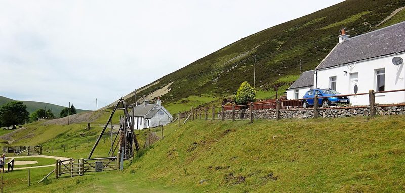 The 1745 water bucket pumping engine at Straitsteps, with the miners' cottages behind it.