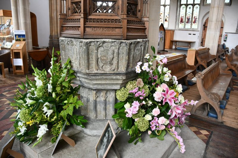 A perpendicular octagonal font of Purbeck Marble at Holy Trinity Church, Long Melford, Suffolk.
