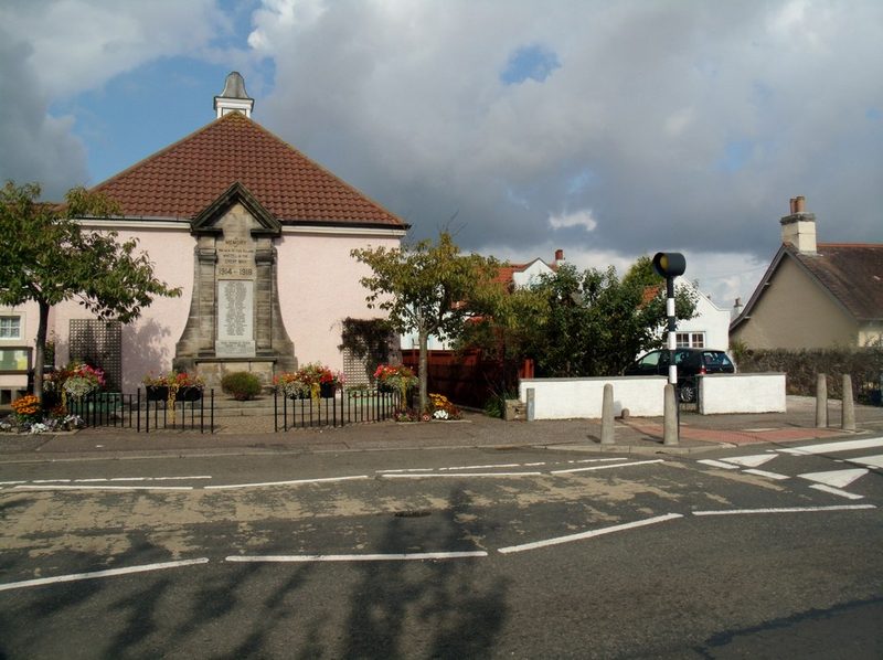 A stone-fronted institute building with a war memorial in front of it at Coaltown of Wemyss in Fife