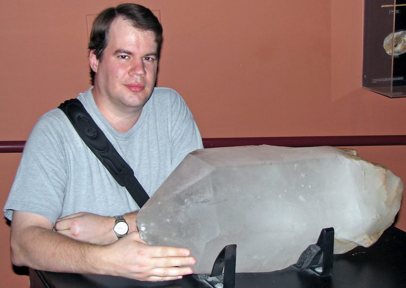 A large quartz crystal specimen, showing the mineral's characteristic glassy hardness — the material that made vein quartz reefs stand out clearly enough for prospectors to follow.