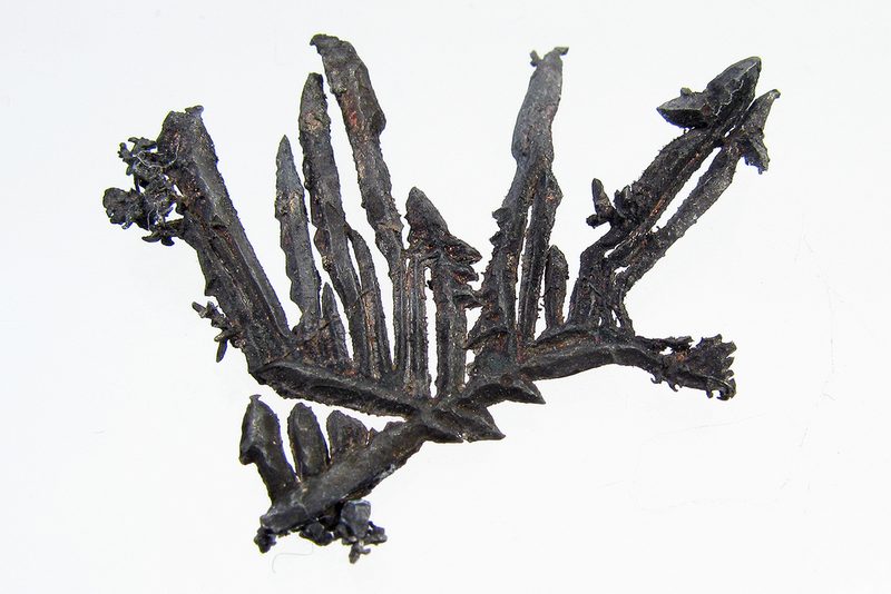 Dendritic native silver crystals — the rare free form of the metal, as opposed to the argentiferous galena from which almost all British silver was actually recovered.